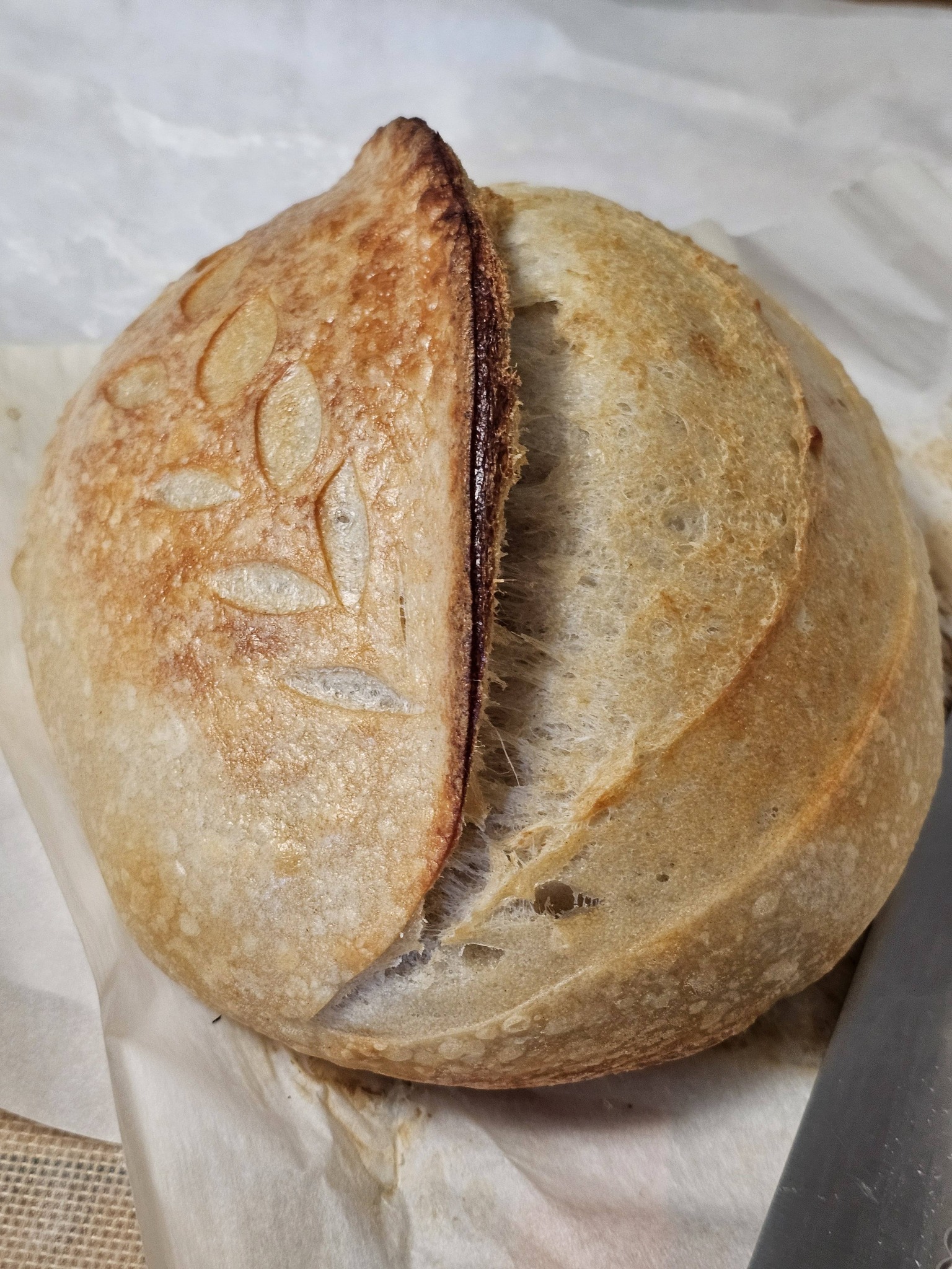 Gallery image of a loaf of plain sourdough bread